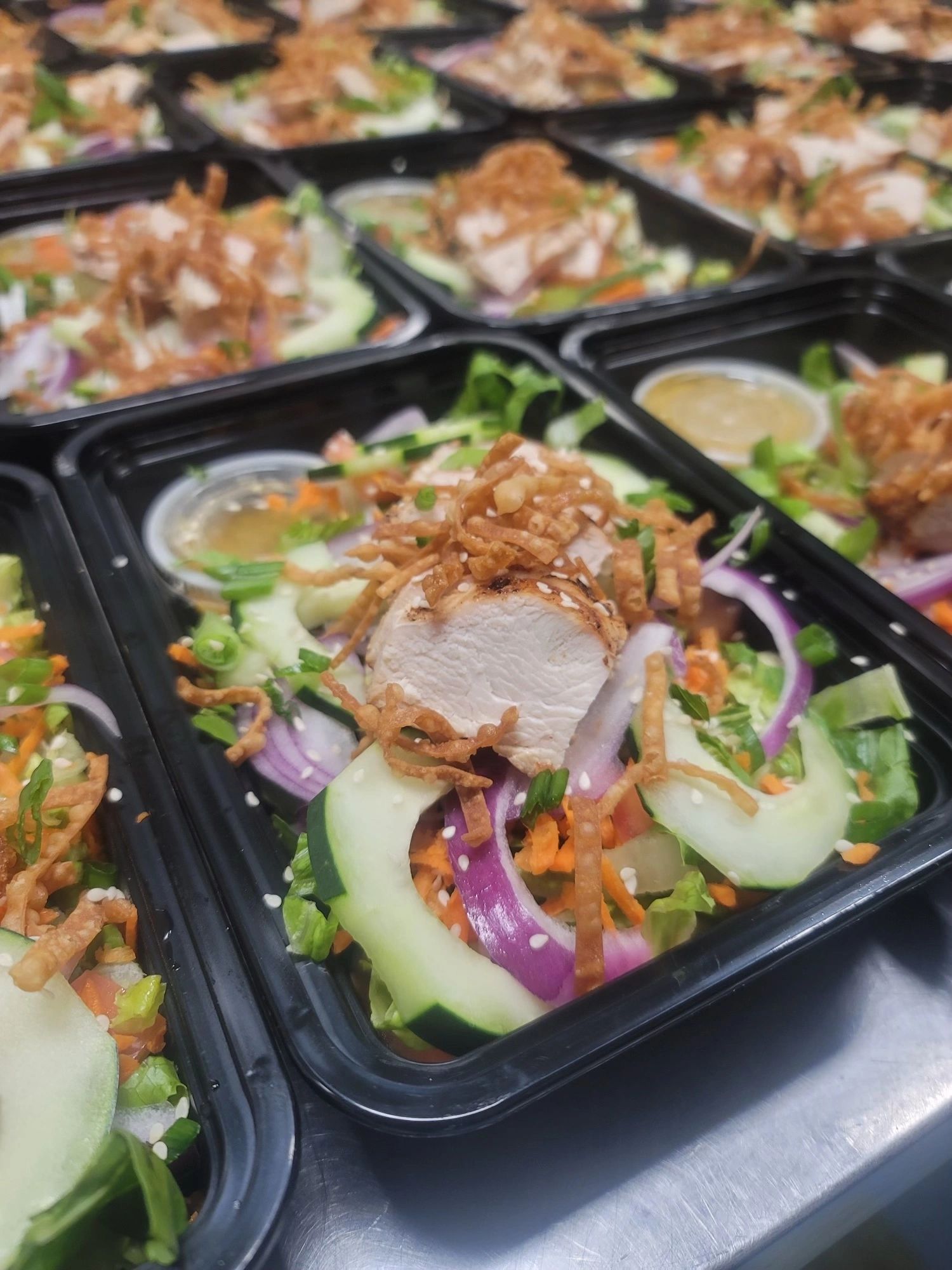 Meal prep containers with fresh food